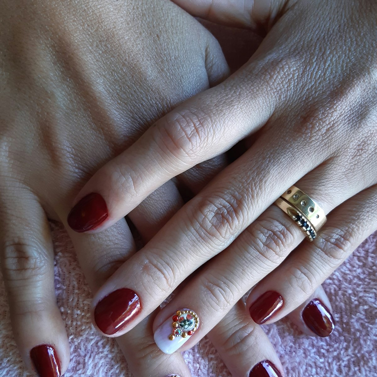 Burgundy nail art with accent nail